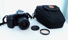 Fotocamera reflex pellicola 35mm vintage MINOLTA DYNAX 300si con obiettivo zoom 