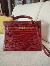 Borsa stile Kelly artigianale fine anni 60, in coccodrillo color bordeau. 