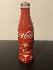 Bottiglia avvolta Coca Cola