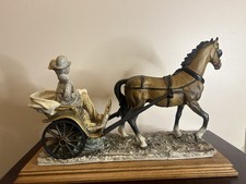 Grande statuina stile