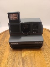 TESTATA-COME NUOVA(-) Polaroid