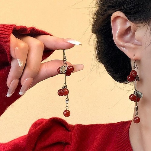 Orecchini con perline rosse