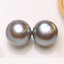 Coppia di perle sfuse tonde