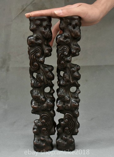Coppia sculture peso carta