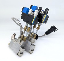 Pistola/applicatore adesivo