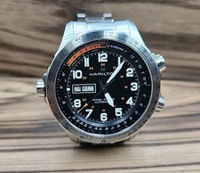 Orologio HAMILTON Khaki X-Wind Lefty quadrante nero e arancione acciaio inox.