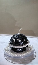 Candela decorata su base   con