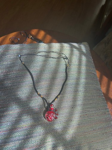 Collana bottiglia profumo