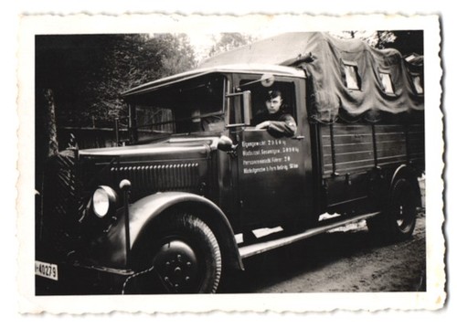 Fotografia camion man con telo - con,