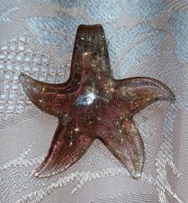 CIONDOLO STELLA MAGENTA- VETRO DI MURANO 