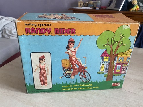 Rarissima bambola con bici