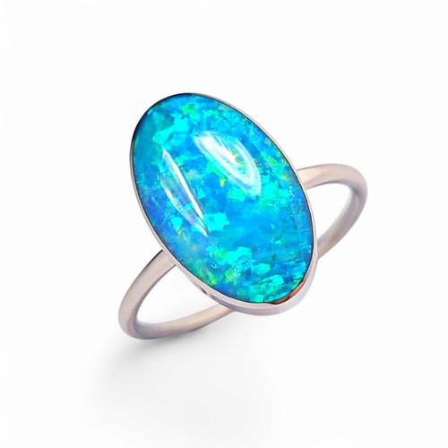Anello orbe verde - oro, bianco
