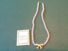 collana in quarzo rosa con pendente in metallo dorato e swaroski