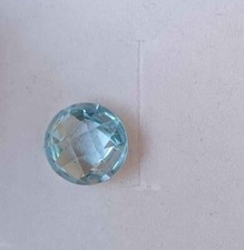  Topazio Naturale azzurro Tondo ,  circa 7 carati ,diametro 12 mm.