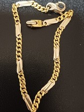 Bracciale da uomo in oro giallo e bianco 18Kt.