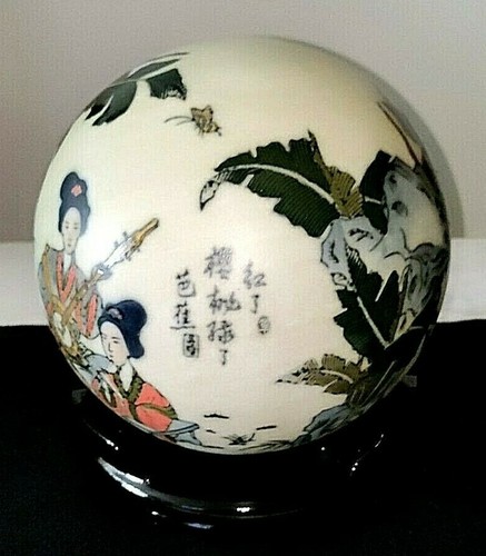 Scultura sfera musicisti