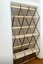 VENDO libreria di design romboidale con dettagli in ferro, ottone e legno.