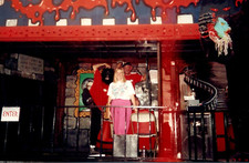 1980s Girl Standing Next to Creepy Gorilla Carnival Ride Scary Mask Photo