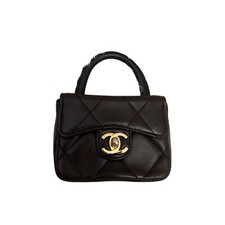 Borsa Chanel Mini in pelle nera trapuntata con dettagli in metallo dorato