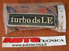 SCRITTA TURBO DS LE 82486093 LANCIA THEMA LOGO MASCHERINA CALANDRA ORIGINALE