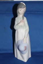 NAO BY LLADRO BAMBINA CON