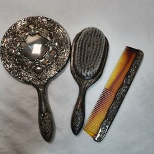 Set di 3 spazzole e pettine