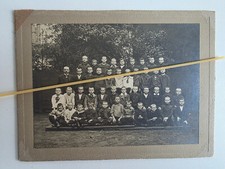 Antica foto ricordo di una classe con il suo insegnante dei primi del 900