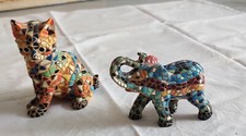 sculture di animali in resina multicolore