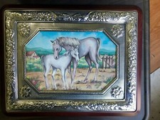 Quadro con cornice d'argento