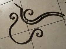 Riccio in FERRO BATTUTO tondo frammento di ringhiera testiera forgiato a mano da