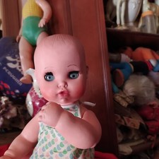 DOLCE BAMBOLA PUPA FURGA OCCHI