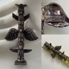 Spilla totem Guglielmo Cini