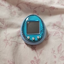 Tamagotchi IDL - Blu - Lingua
