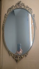 Specchio ovale da parete
