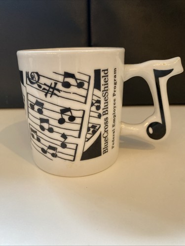 Tazza caffè manico note