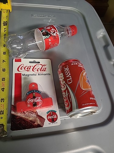 Three coca cola - items, j)