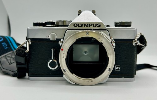 Olympus reflex analogica - om-1,