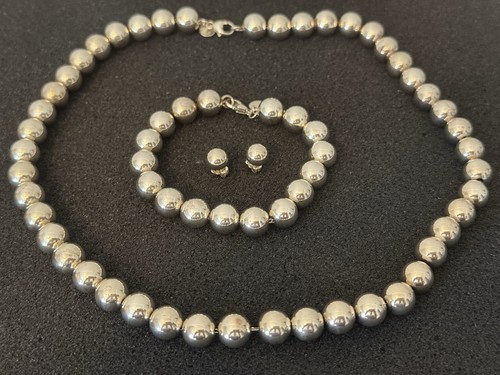 Collana bracciale orecchini - e,