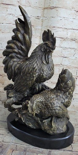 Statua uccellino gallo gallina