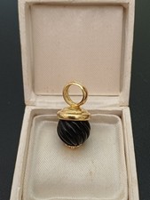 Charm in oro 18Kt.con pietra Onice