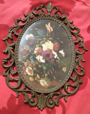 Quadro dipinto con motivo floreale con cornice ovale  in metallo
