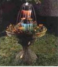 FONTANA EFFETTO LEGNO DI ABETE  CON GIOCHI D'ACQUA E  FIORIERA