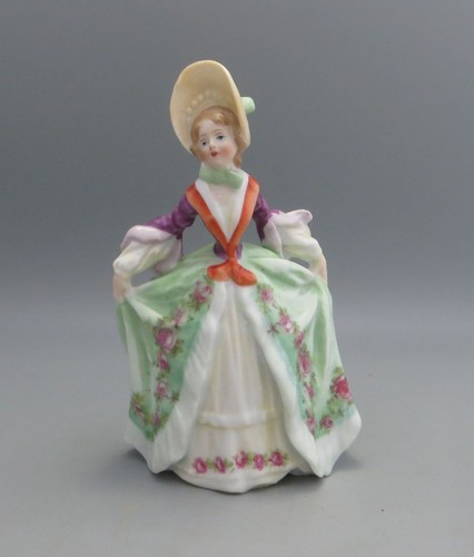 Antica campana statuina dama