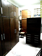 2 Armadi a 4/ ante; Comò/libreria; 2 comodini, anni '70. Noce Wengè.  Sol