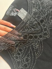 Top smanicato nero episodio