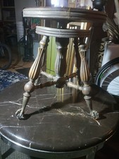 Antico sgabello girevole per