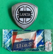 LANCIA  Fregio in plastica e Logo in metallo