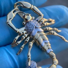 Ciondolo scorpione tondo