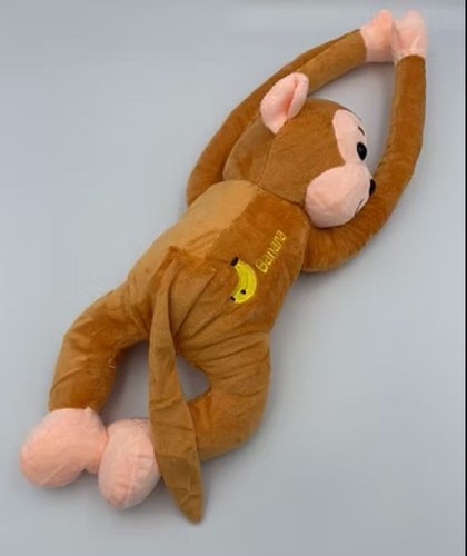 Peluche scimmia con braccio