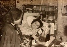 1960s Girl Friend Lying in Bed
